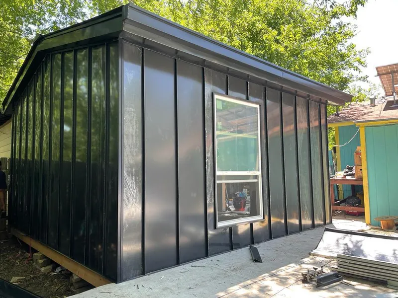 Black standing seam metal wall panels for Roof Inspection in Sebastian