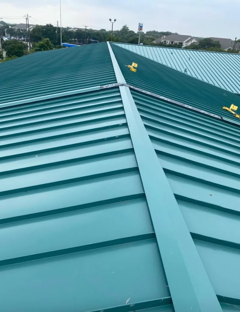 Green commercial metal roof ridge and valley for Metal Roof Repair in Sebastian